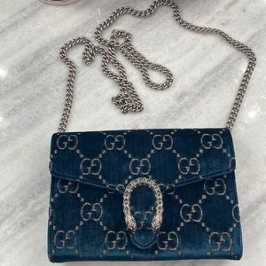 Green Gucci monogram crossbody clutch purse